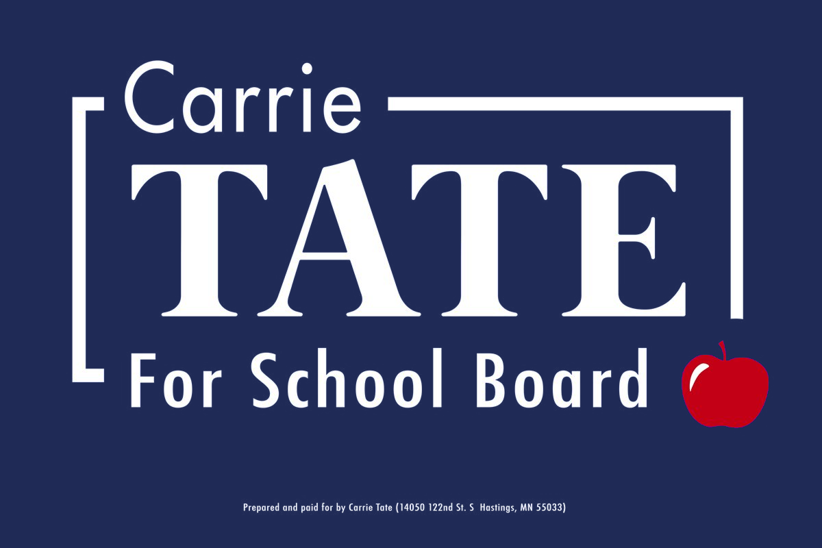 Carrie Tate for School Board yard sign: white text and a red apple on a navy blue background